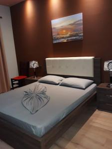 Postel nebo postele na pokoji v ubytování Hotel Nuanti