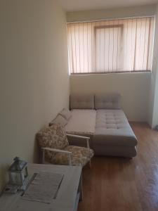 Ein Bett oder Betten in einem Zimmer der Unterkunft Apartmani MV