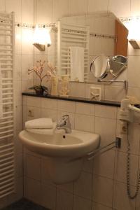 Et badeværelse på Ferienwohnungen Mantke SNF zertifiziert