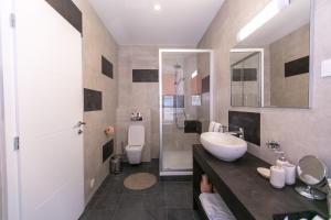Kúpeľňa v ubytovaní Apartments Del Molo + 37 fotografií