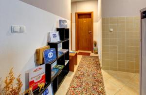 a room with a hallway with a tile floor at Pansion Villa Nur in Mostar