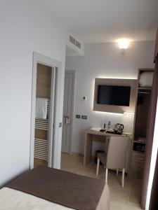 Krevet ili kreveti u jedinici u okviru objekta Netum Hotel