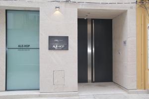 an entrance to a building with a sign on it at StayInn City - Póvoa de Varzim in Póvoa de Varzim