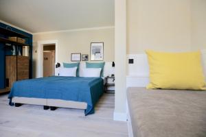 Postel nebo postele na pokoji v ubytování Hotel Boje06