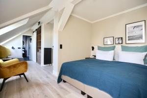 Postel nebo postele na pokoji v ubytování Hotel Boje06