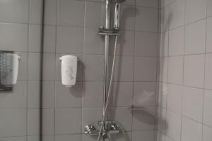 a shower in a bathroom with a shower at StayInn City - Póvoa de Varzim in Póvoa de Varzim