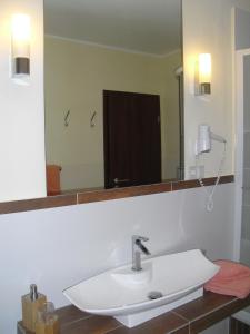 Ванна кімната в Gasthof zum Lahntal