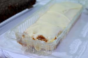 a plastic container with a piece of cake in it at Hostel Prime in Rio Verde