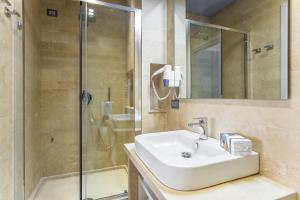 Kupatilo u objektu Netum Hotel