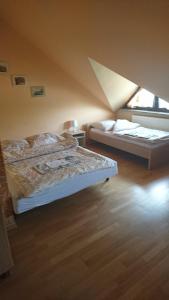 Łóżko lub łóżka w pokoju w obiekcie Ośrodek Sportu i Rekreacji Góra Kamieńsk