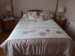 Voodi või voodid majutusasutuse Laurel Lodge toas