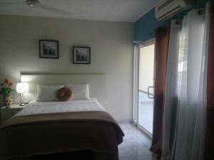 Voodi või voodid majutusasutuse Hotel Vista del Mar toas