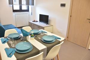 TV a/nebo společenská místnost v ubytování Porta Piccola Residence