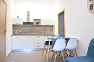 Kuchyň nebo kuchyňský kout v ubytování Porta Piccola Residence