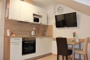 Кухня или кухненски бокс в Apartments Borna 2