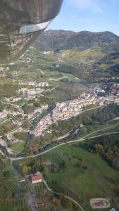 a view of a village from an airplane at LE RIVE - Soggiorno/Vacanza a TUFO (Avellino) in Torrioni