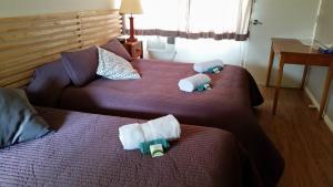 
A bed or beds in a room at Cherrabah Resort Warwick
