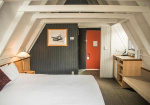 Postel nebo postele na pokoji v ubytování Heartland Hotel Queenstown