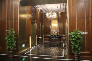 Lobbyen eller receptionen på Qingdao Elegant Central Apartment