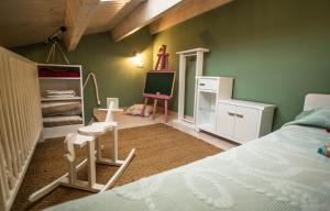 Postel nebo postele na pokoji v ubytování Casa de Abaixo