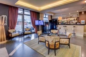 TV a/nebo společenská místnost v ubytování Best Western Plus Hotel Expo