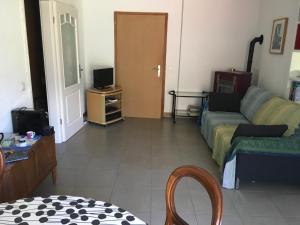 TV in/ali zabaviščno središče v nastanitvi Casa in Königs GarteN