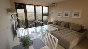 A seating area at Lighthouse Golf Private Villa Lake view