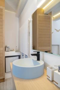 Ένα μπάνιο στο Nine - Cozy Rooms