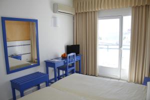 Hotel Virgen del Marにあるベッド