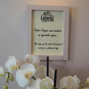 Um certificado, prêmio, placa ou outro documento exibido em Hotel Continental