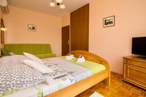 Postel nebo postele na pokoji v ubytování Pansion Adria