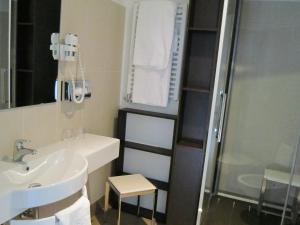 Koupelna v ubytování Albergo Accademia + 37 fotografií
