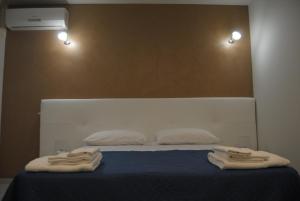 Un pat sau paturi într-o cameră la Il Baglietto