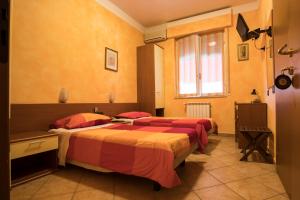 Postel nebo postele na pokoji v ubytování Albergo Ristorante Brera