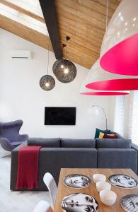 Televízia a/alebo spoločenská miestnosť v ubytovaní Apartament Sun House SAUNA KOMINEK SKRZYCZNE