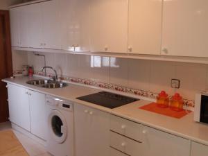 A kitchen or kitchenette at Casa El Reloj