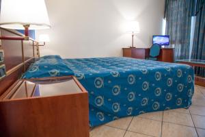 Postel nebo postele na pokoji v ubytování Assinos Palace Hotel