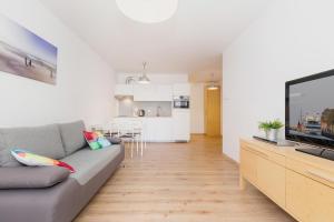 Kuchyňa alebo kuchynka v ubytovaní Apartamenty Polanki Park BASEN, SAUNA & SIŁOWNIA by Noclegi Renters