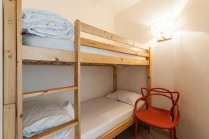 Ένα ή περισσότερα κρεβάτια σε δωμάτιο στο Residhotel Le Grand Prado