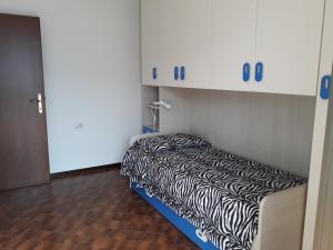 Postel nebo postele na pokoji v ubytování Cà Sassello
