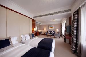 Voodi või voodid majutusasutuse Hotel Royal Macau toas