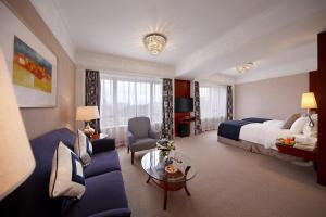 Voodi või voodid majutusasutuse Hotel Royal Macau toas