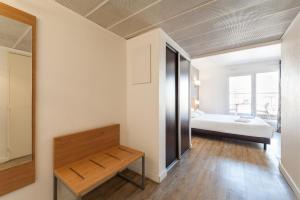 Ένα ή περισσότερα κρεβάτια σε δωμάτιο στο Residhotel Le Grand Prado