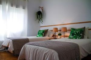 Łóżko lub łóżka w pokoju w obiekcie Real Beds Madrid