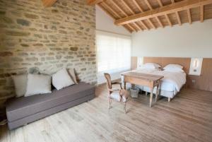 Gaiattone Eco Resort tesisinde bir odada yatak veya yataklar