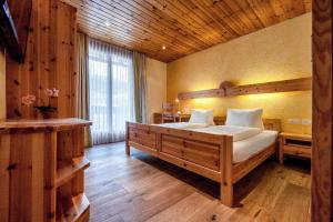 Postel nebo postele na pokoji v ubytování Hotel Astoria