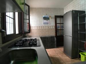 Kuchyň nebo kuchyňský kout v ubytování Casa El Cabrero