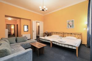 Ένα ή περισσότερα κρεβάτια σε δωμάτιο στο Hotel Boston