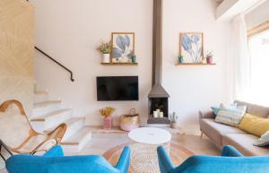 Televízia a/alebo spoločenská miestnosť v ubytovaní Casa Dolce Riera I - Sa Riera (Begur)