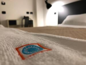 Postel nebo postele na pokoji v ubytování Albergo Milazzo Inn AiMori